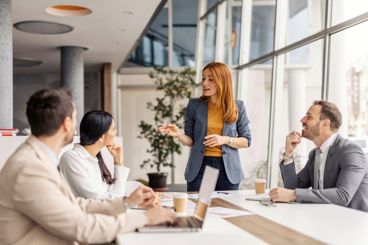 Hero lady employer running meeting