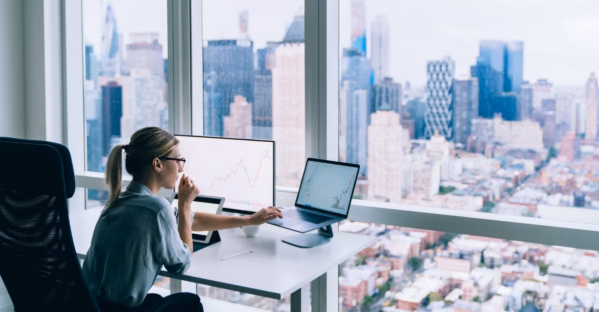 Woman working laptop city