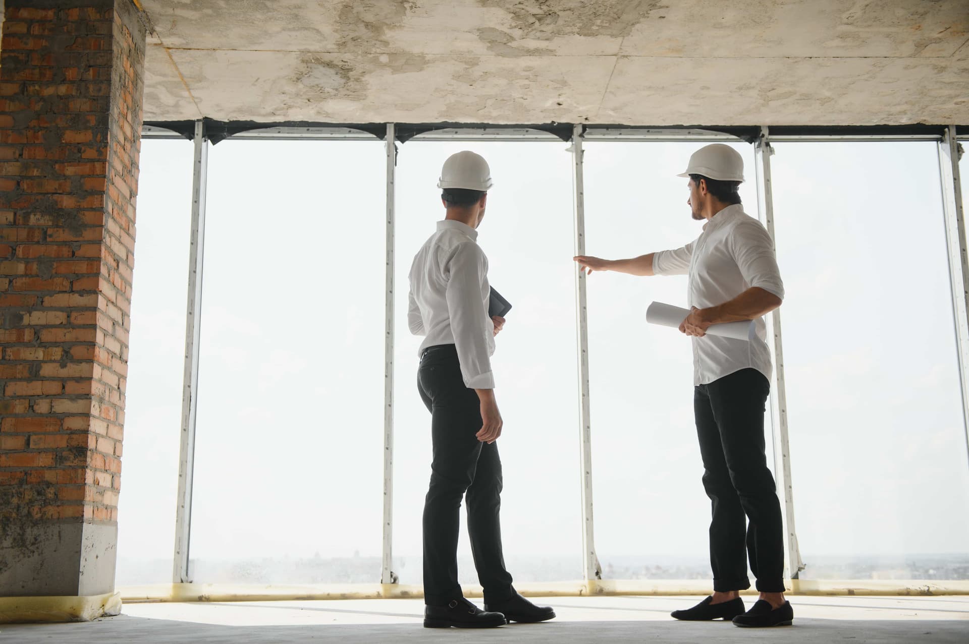 construction workers building plan